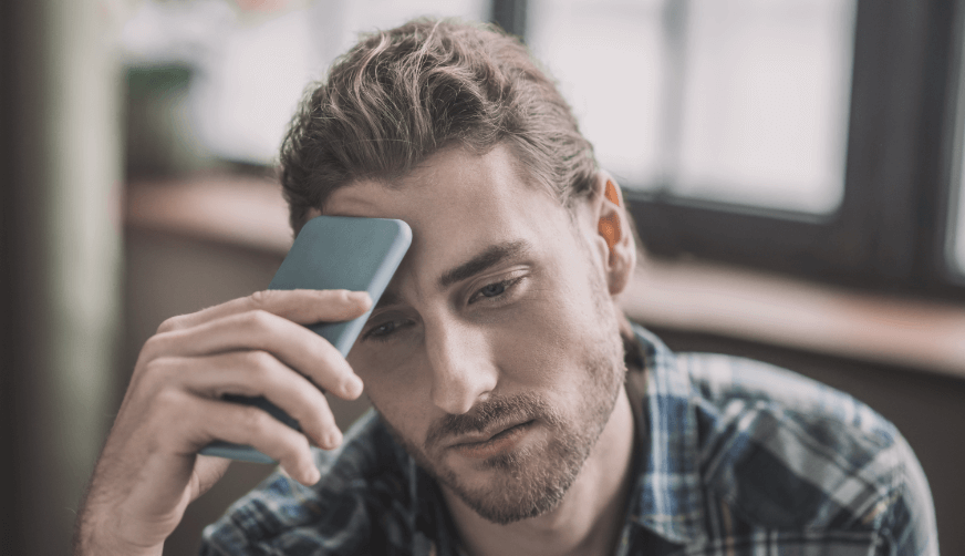 man on the phone frustrated because his block manager won't resolve issues